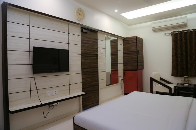 Golden Plaza Hotel Ahmedabad Quarto foto